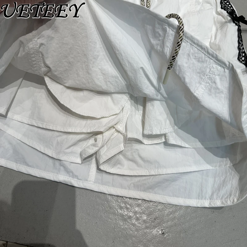 صيف جديد متعدد الاستخدامات الرباط مرونة عالية الخصر حافة الشريط تصميم تنورة قصيرة القوس المضادة للضوء بطانة ألف كلمة التنانير الصغيرة