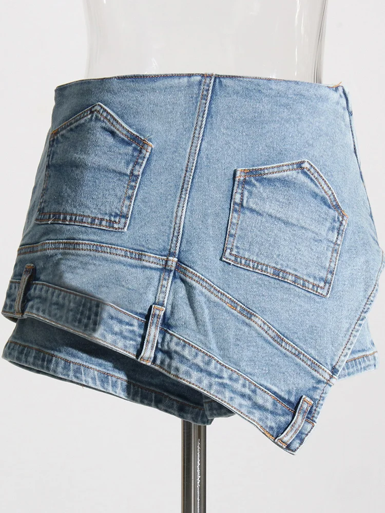 TWOTWINSTYLE Spliced Button Casual Denim Pant For Women High Waist Patchwork Pocket Irregular Streetwear Shorts Skirts Female