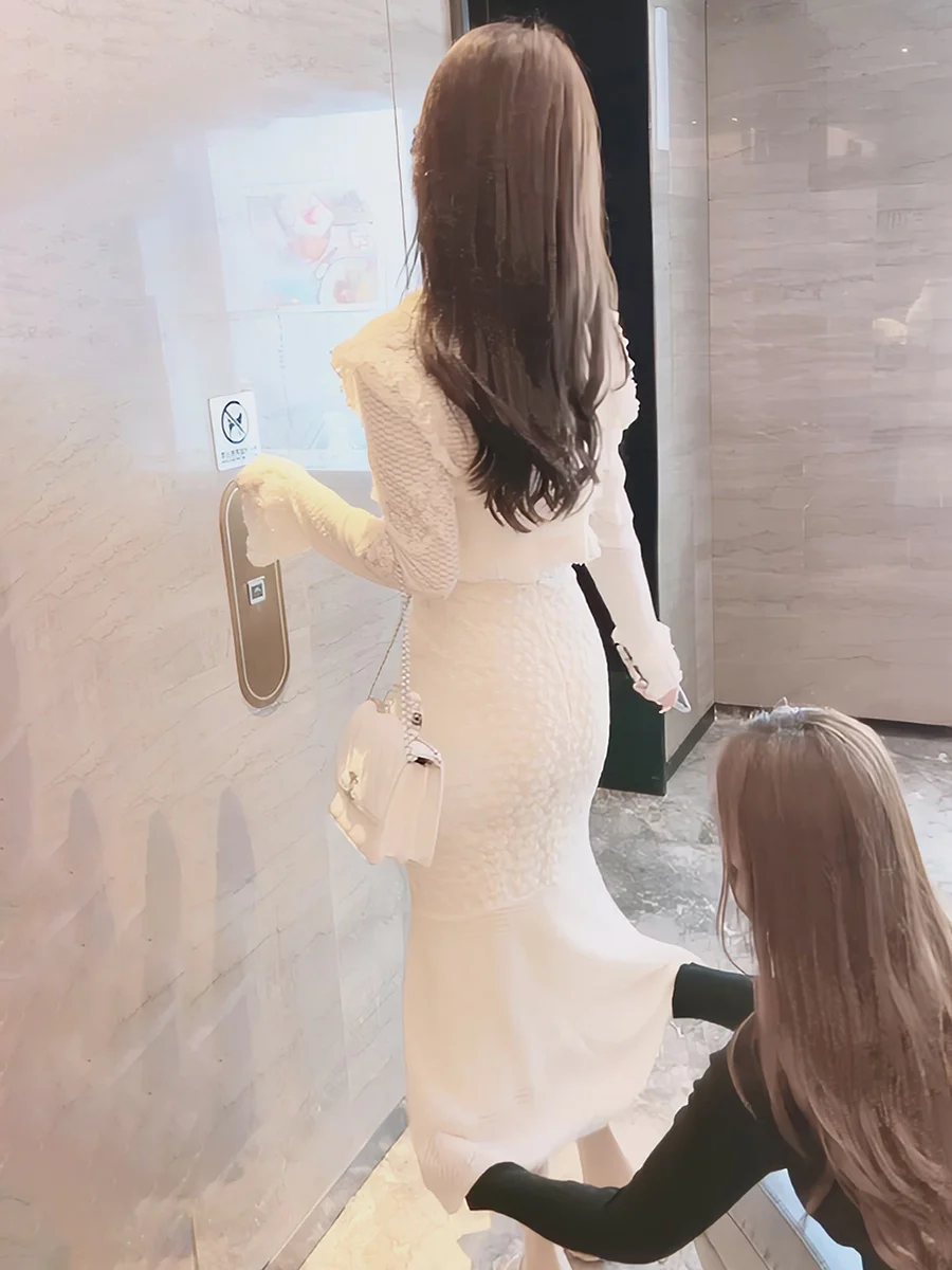 

Новый китайский комплект: женский костюм-двойка весна 2026 – юбка-русалка макси и топ с кружевной отделкой