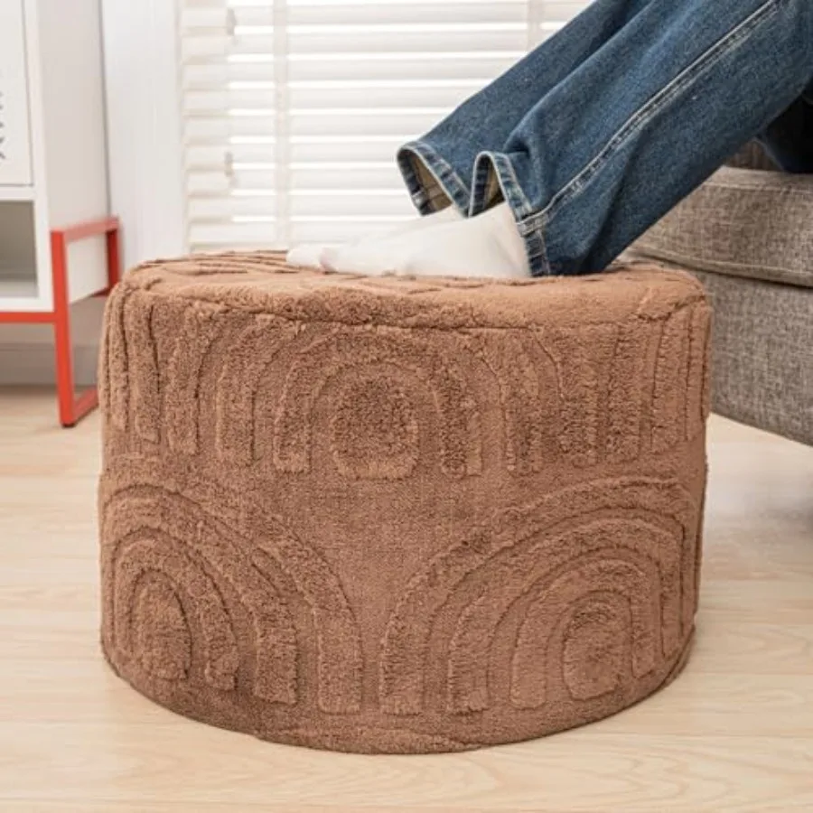 

Living room ottoman pouf in faux fur, cream color, soft plush texture and non-slip bottom for comfort and stability