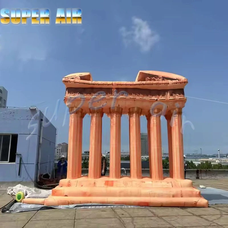 Énorme colonnes romaines rétro, colonne gonflable orange avec souffleur pour la décoration