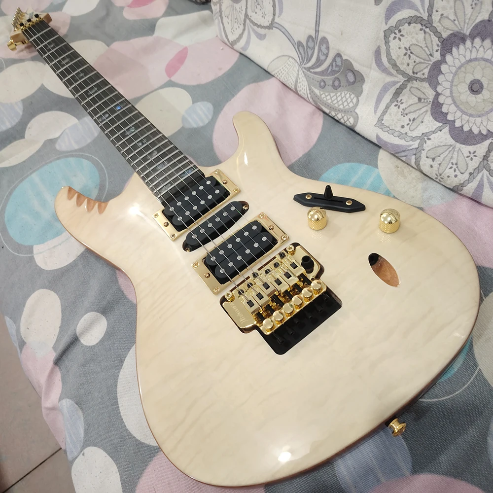

High quality natural wood color electric guitar, golden Floyd vibrato system, ergonomic design, in stock and fast shipping
