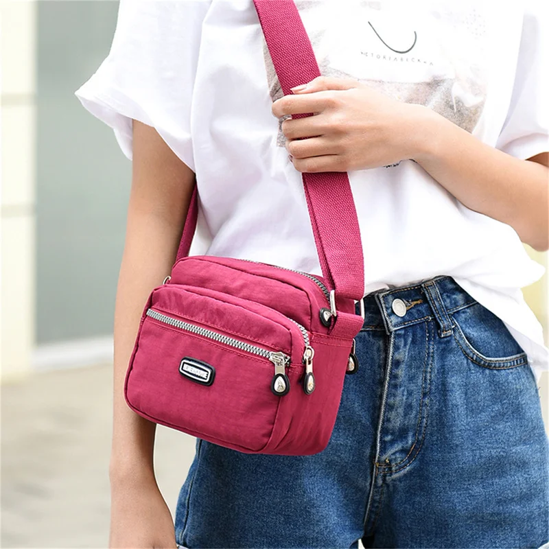 Torby na ramię Kwiatowe spotkanie Najlepiej sprzedający się model Wielokrotna moda Przenośna prosta nylonowa zwykła kosmetyczka Torba na ramię