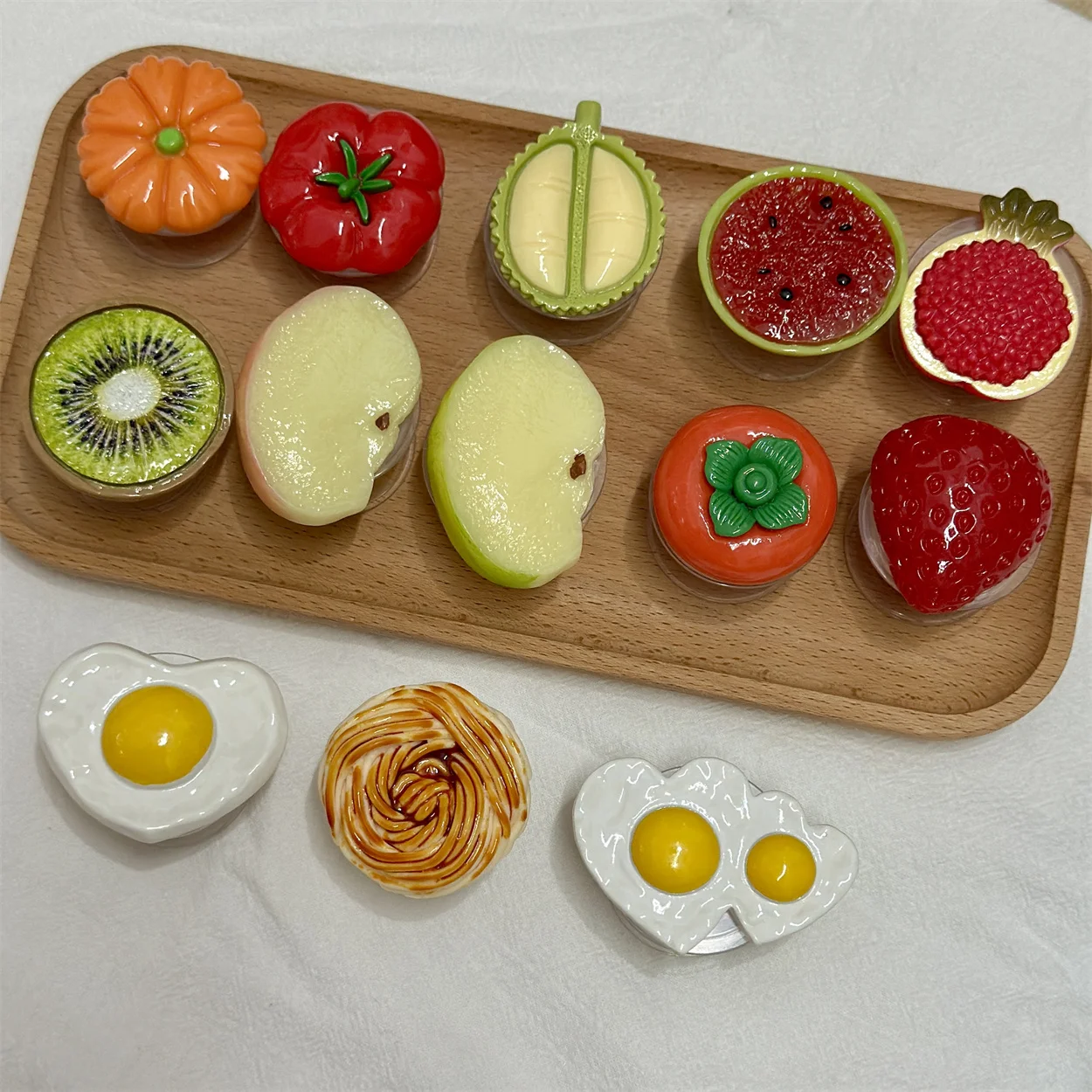 

Creative Korean Fruit Phone Airbag Holder for IPhone17air 16 Samsung S25 Grip Tok Griptok Stand Bracket