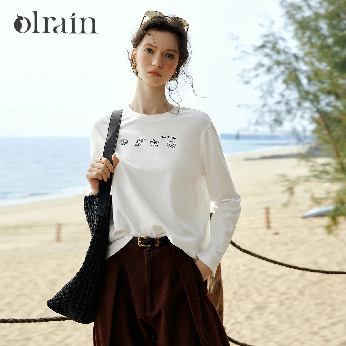 OLrain Damen-T-Shirt mit langen Ärmeln, weiß, Frühling 2026, neu, Rundhalsausschnitt, Muschel-Stern-Stickerei, locker, lässig, minimalistisch, Top O58CT003683