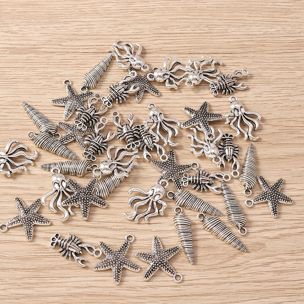 Tusember 10 Stück niedliche Anhänger aus Legierung in Form von Fisch, Qualle, Seestern und Muschel für die Schmuckherstellung von Halsketten, Ohrringen, Armbändern, DIY – Detail 2