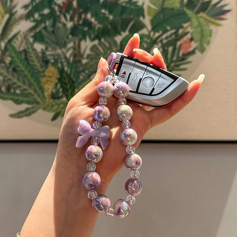 Брелок-бабочка с бантом, украшенный бисером