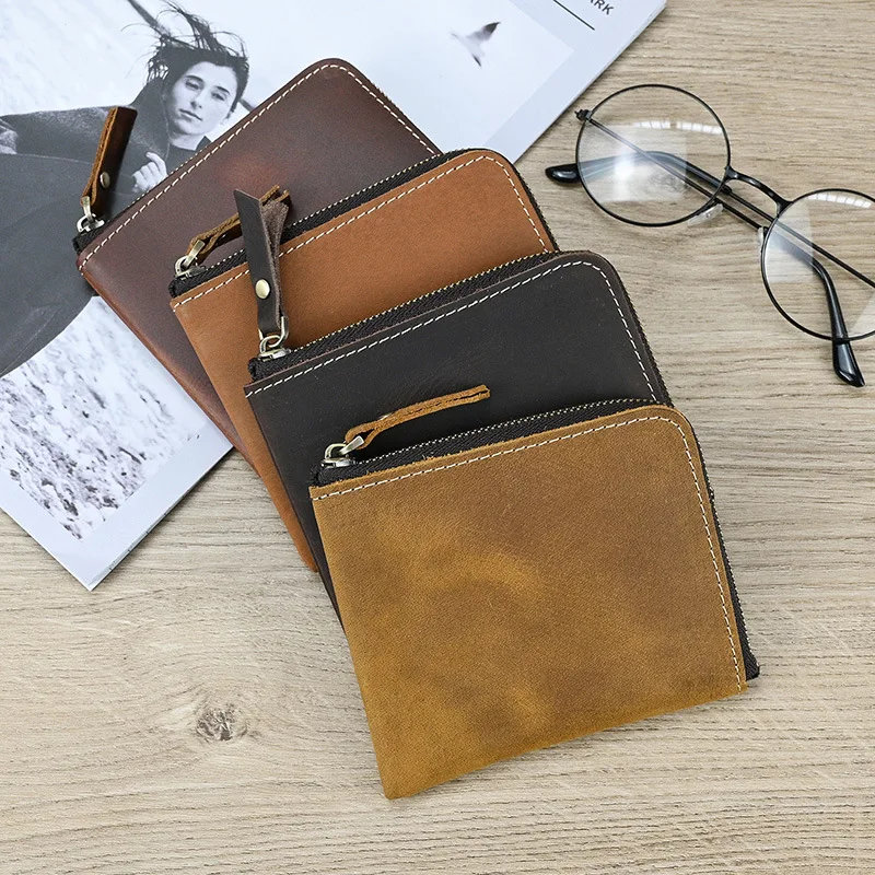 The new men's Crazy Horse leather change bag is simple and compact, the first layer of cowhide zipper small money bag, and the g