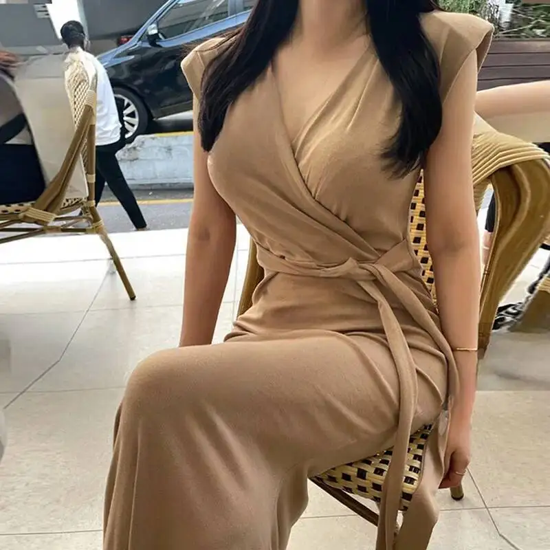 Corea sexy vita-serraggio cravatta spalla imbottita profondo scollo a V elegante abito lungo senza maniche moda donna sexy top UTW2