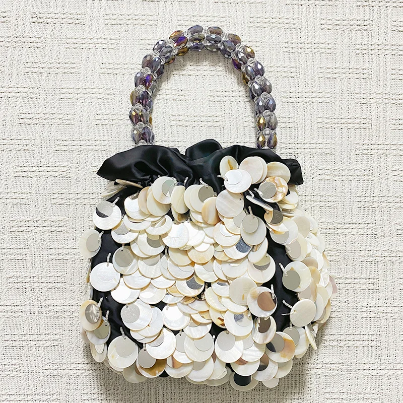 

2025 Spring/Summer New High end Handmade Woven Shell Bag, Fairy Handheld Women's Bag, Niche Bag, Personalized Trend