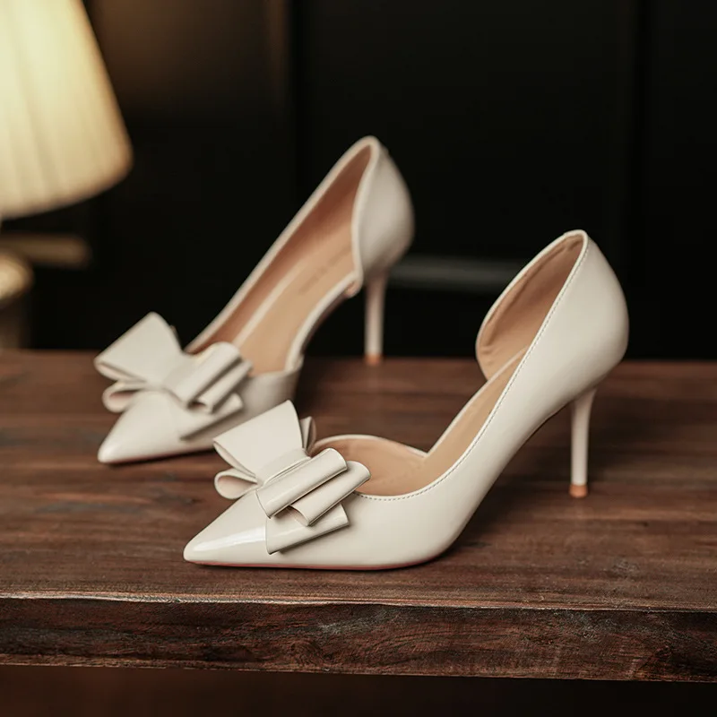 

2025 new Women's wedding shoes dress sexy pointed single shoes stiletto middle heel bow pointed white solid shallow ladies pumps