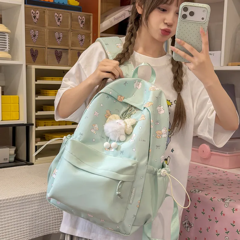 Cute women's backpack for travel, lightweight and stylish, suitable for commuting, cartoon puppy design, suitable for high schoo