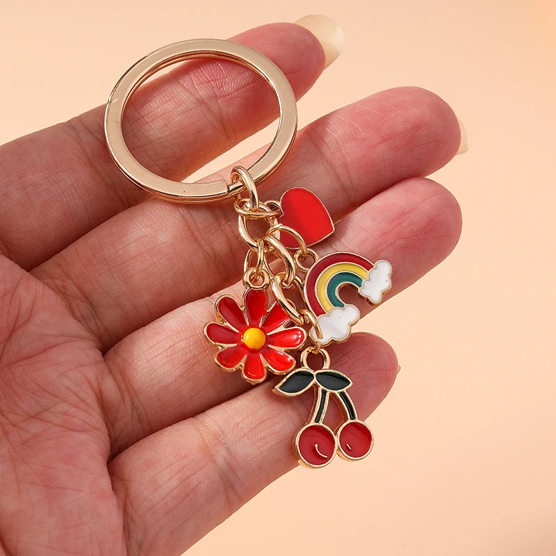 Aihua Niedlicher Emaille-Schlüsselanhänger mit Rotem Herz, Gänseblümchen, Kirsche und Regenbogen für Damen und Mädchen, Handtaschen-Dekoration, DIY-Schmuck, Geschenke – Detail 1