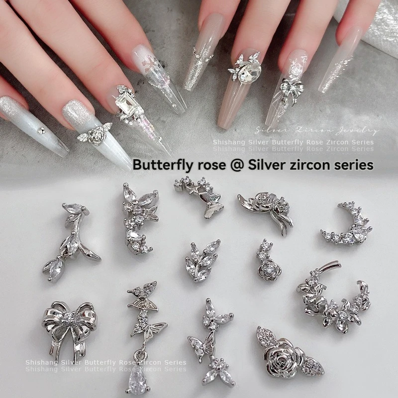 5PCS Nail Art Zircon Bowtie รูป 3D Charms โลหะเงินหรูหรา Rose ผีเสื้อโลหะอัญมณีสําหรับตกแต่งเล็บ