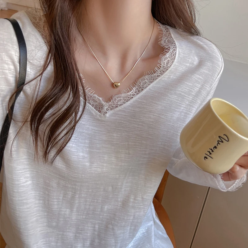 Camiseta Sexy de manga larga con retazos de encaje para mujer, jersey holgado con cuello de pico que combina con todo, Tops básicos de Color sólido para primavera y otoño para mujer