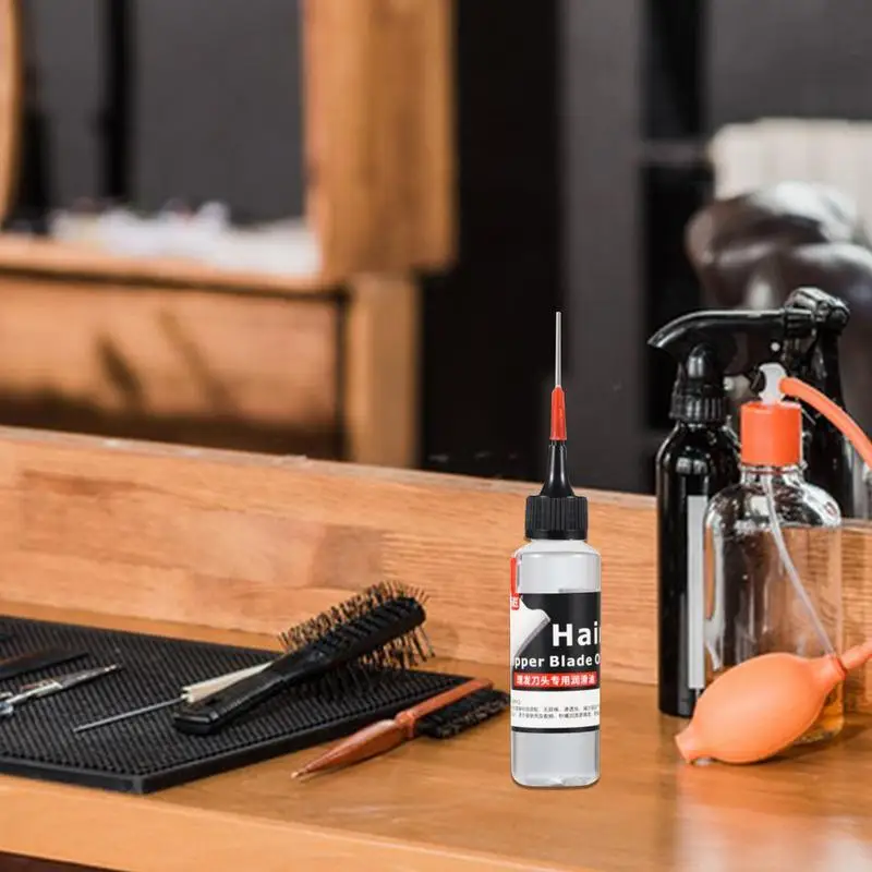 60 مللي مشذب زيت الشعر زيت تشذيب الزيت زيت ماكينة حلاقة عديمة الرائحة يقلل من الاحتكاك زيت الحلاق لأدوات تشذيب الشعر