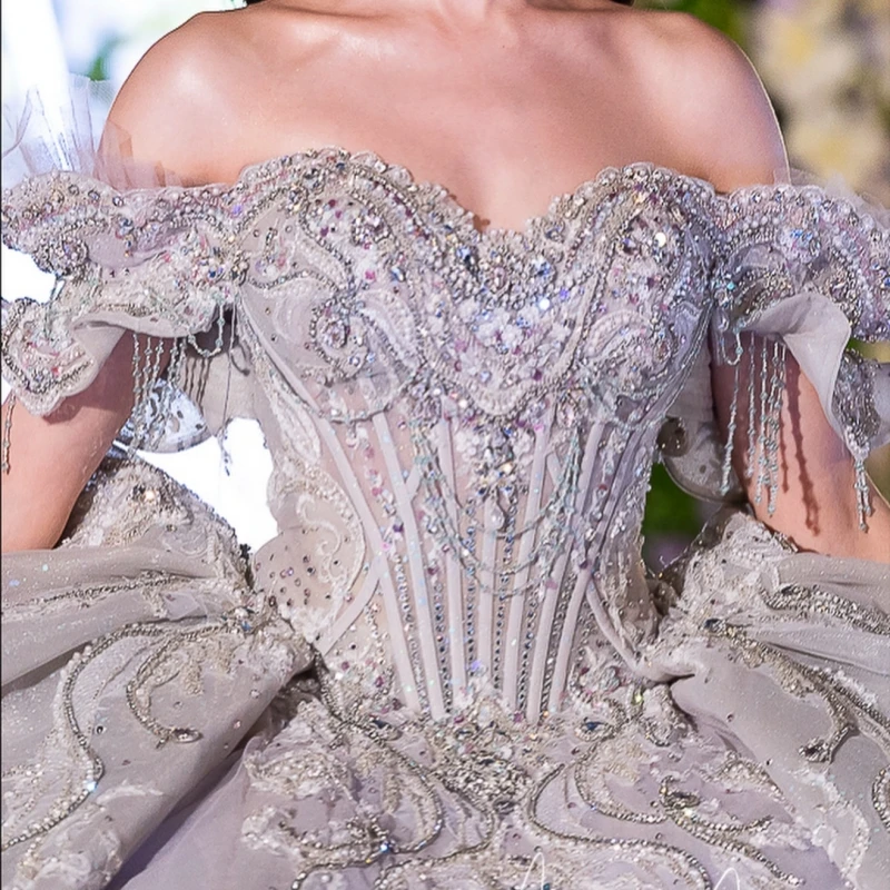 أرجواني فاتح لامع فساتين Quinceanera قبالة الكتف الترتر زين الدانتيل الديكور كريستال تول مشد حفلة عيد ميلاد الحلو 16