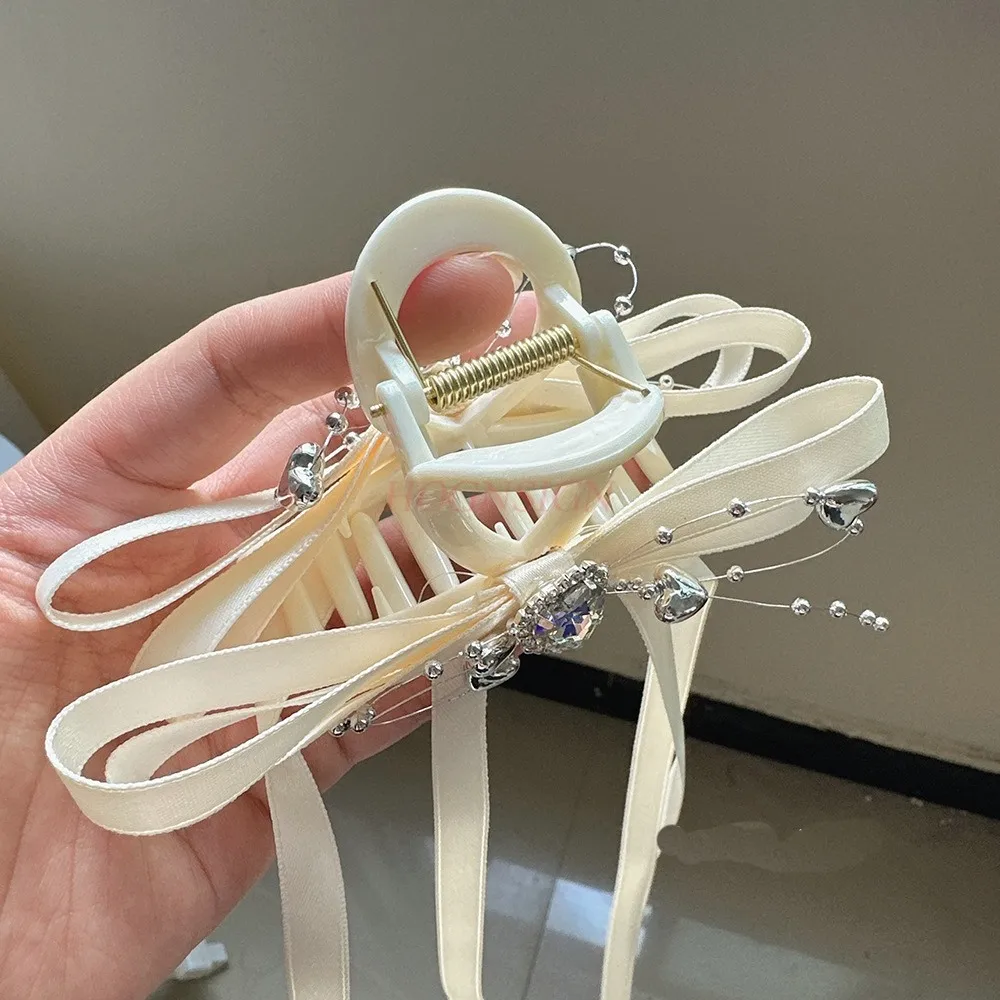 مزاجه Bowknot، مقطع قبضة حجر الراين، شريط شرابة راقي، مشبك شعر ملعقة الرأس الخلفي، مشبك كبير