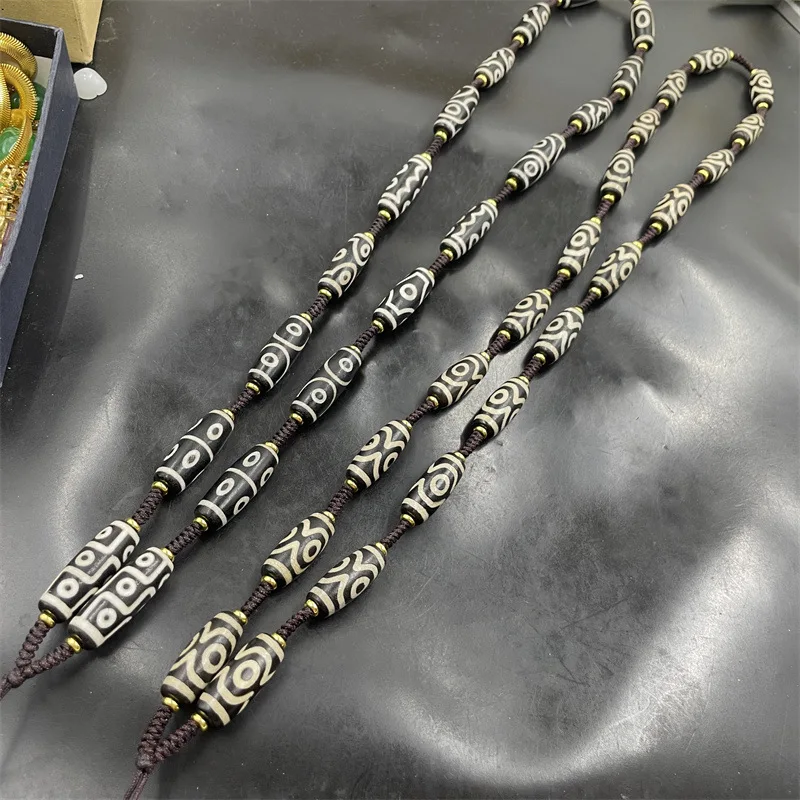 

Three-Eyed Dzi Agate Rice Bead Necklace Cord Sweater Chain