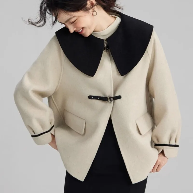 Cappotto In Cashmere A doppia faccia grigio per donna In autunno e inverno 2023, nuovo scialle collo bambola di fascia alta per una nicchia semplice e alla moda