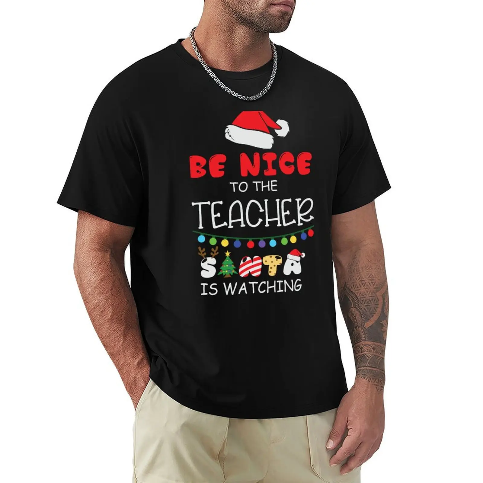 

Be Nice to the Teacher Santa is Watching T-Shirt plain baggy shirts mens t shirt graphic