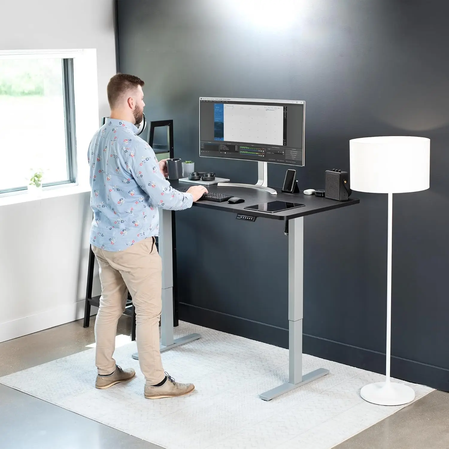 Electric 60 x 30 inch standing desk workstation, memory controller height adjustment, black top grey frame