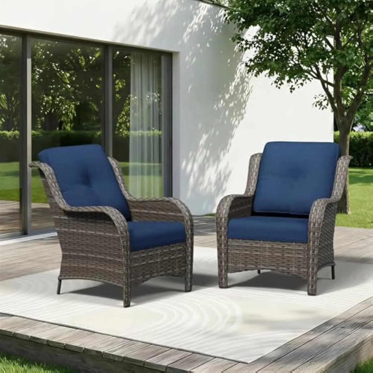 Two stylish outdoor chairs crafted from durable handwoven PE rattan with high backrests and generous deep seating comfort. Featu