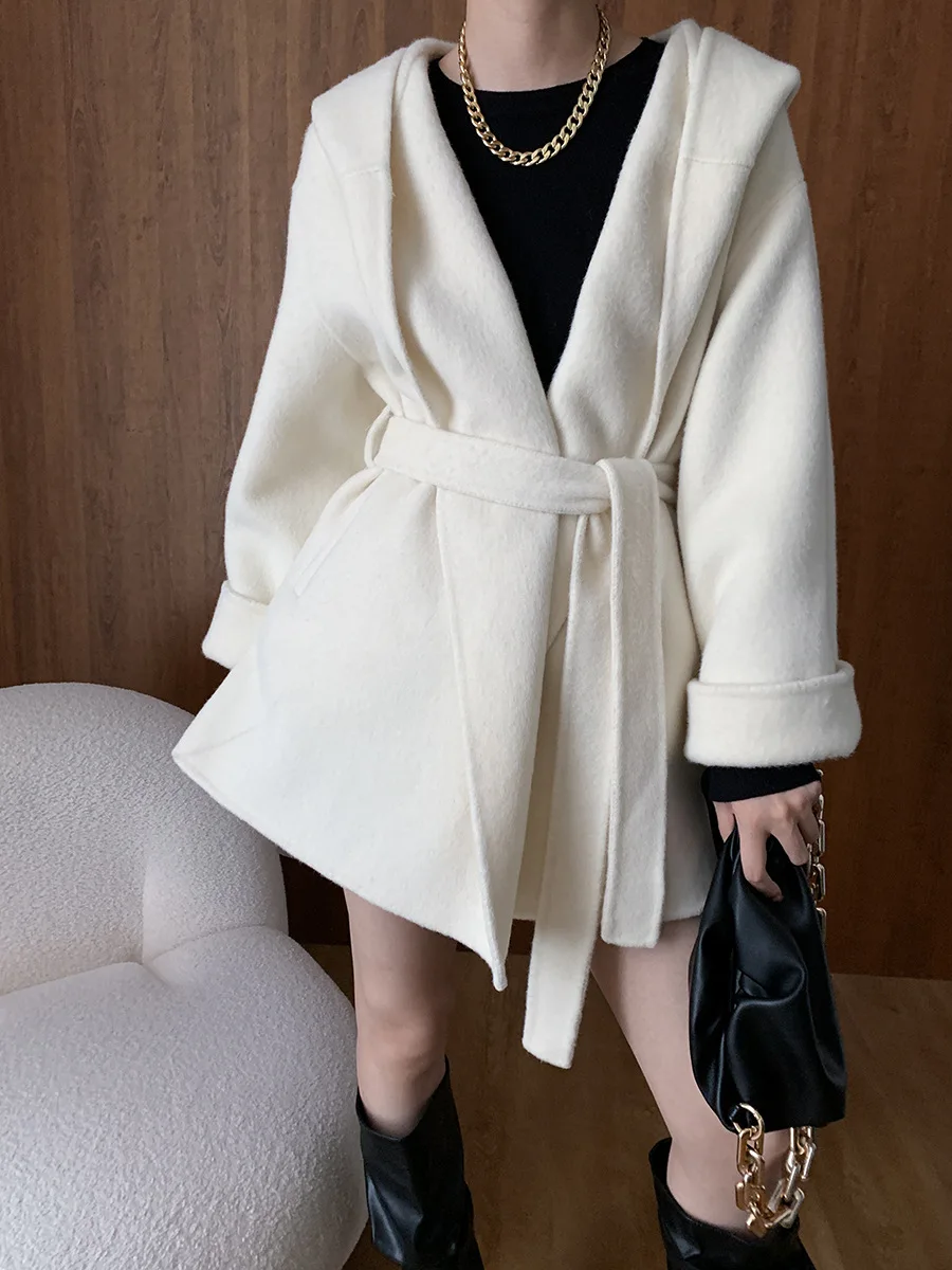 Autumn and winter women's casual solid color belt decoration loose hooded coat