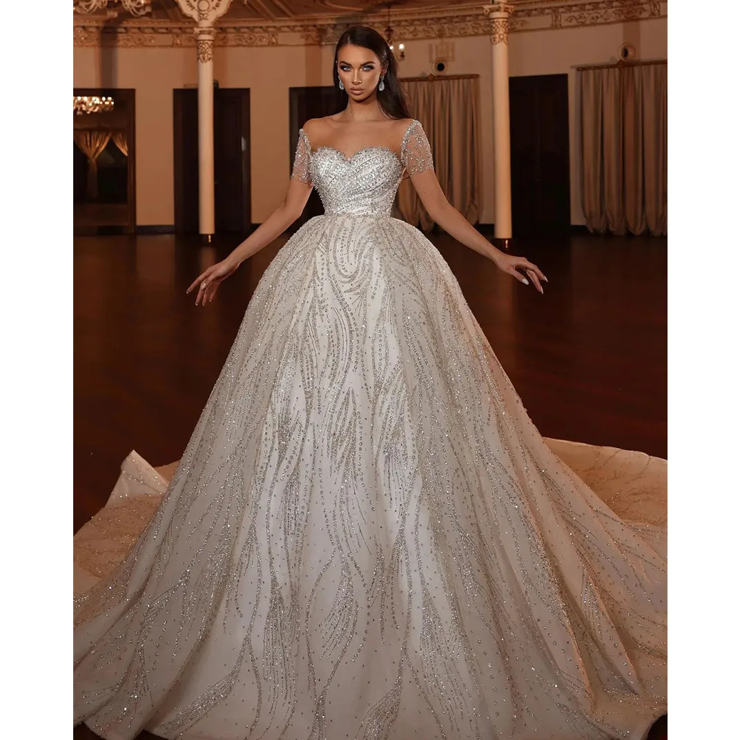 Luxury Ball Gown Wedding Dresses Cape SleevesV Neck Straps Sequins Appliques Ruffles Beads Diamond Bridal Gowns Vestina De Novia