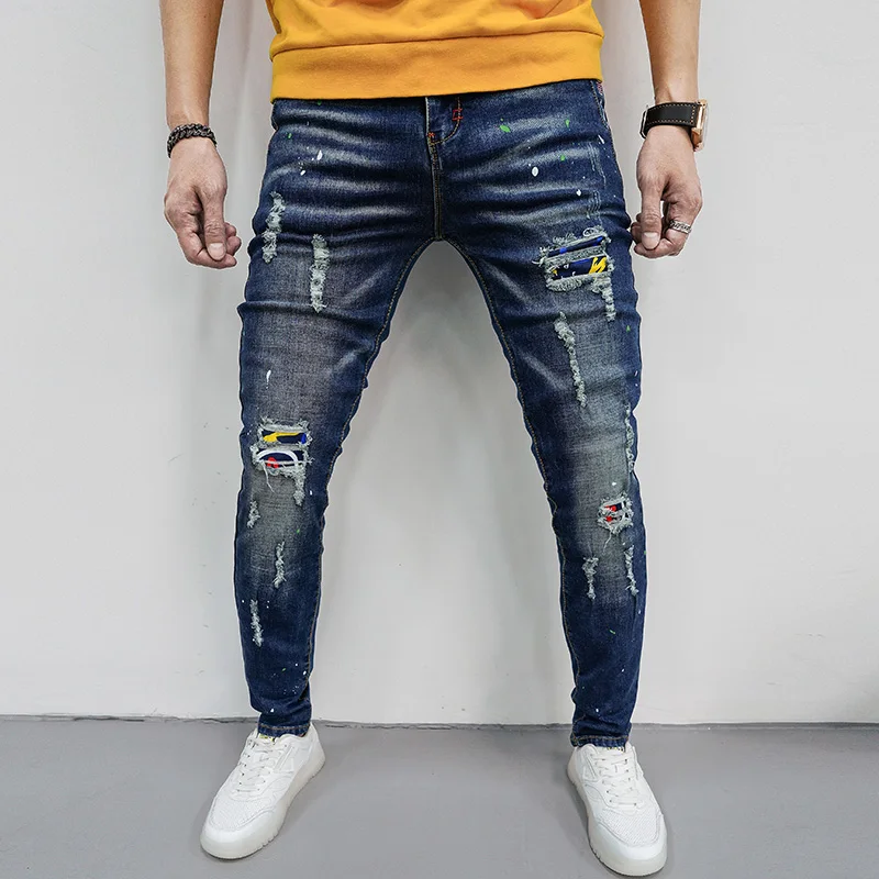 Robek fashion trendi patch jeans pria high-end slim fit all-match Street retro fashion merek Pu Shuai kurus tappered pants