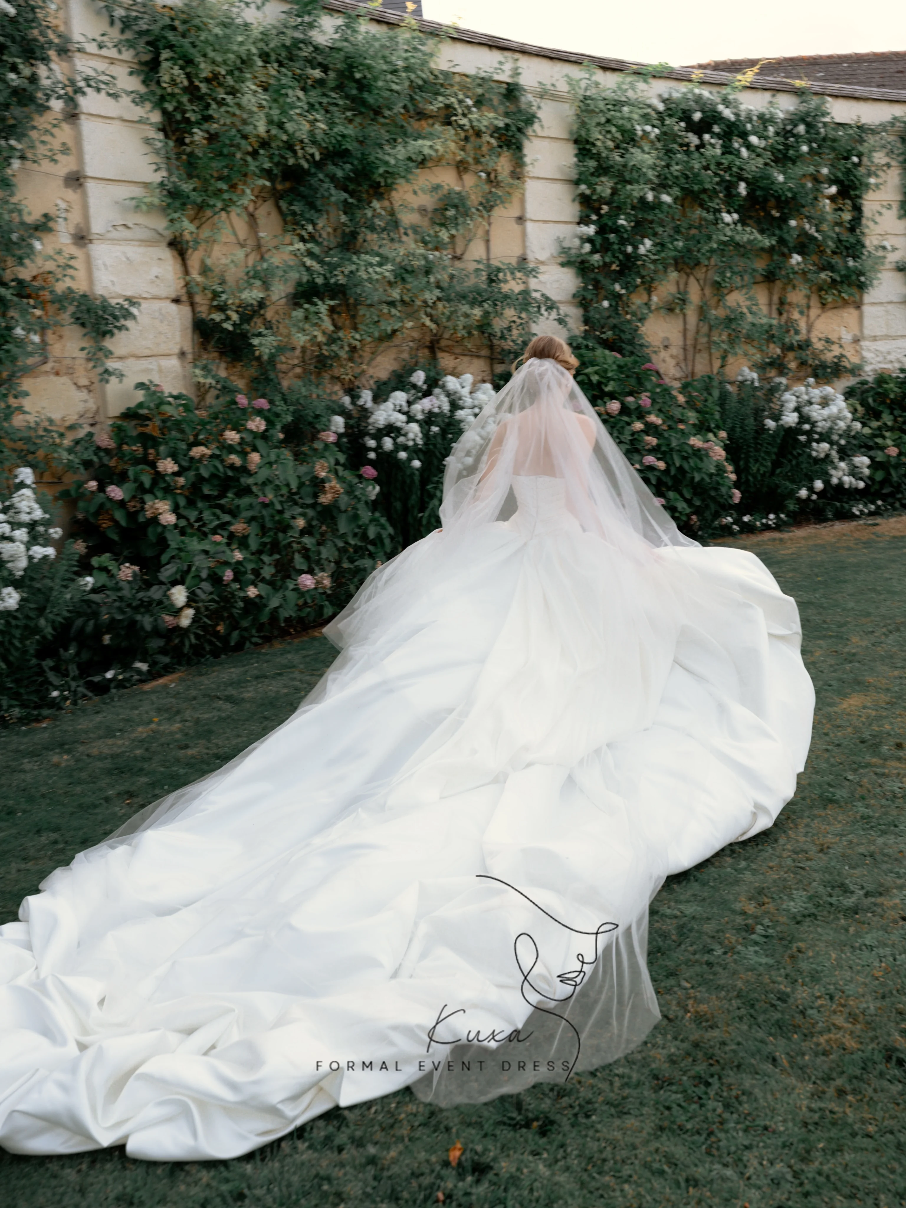 KUXA Customized Luxury Strapless Wedding Dress Pleated Bodice Ball Gown With Extra Long Train For Dreamy Garden Bridal Events