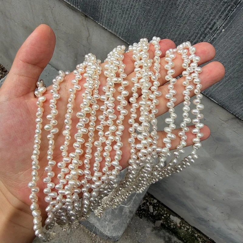 3-3.5mm Sanqi-hole rice beads, offset and irregular, freshwater, nucleus-free, natural, smooth, DIY, extended length 39cm.