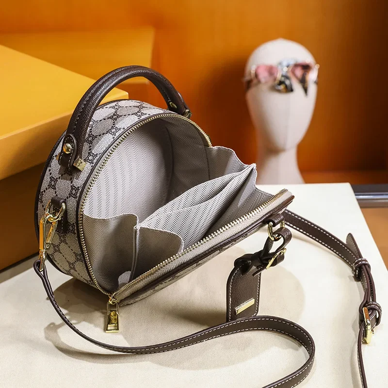 Sac à main élégant pour femmes en cuir véritable, sac à bandoulière et à bandoulière avec détails chics, par un célèbre créateur de luxe