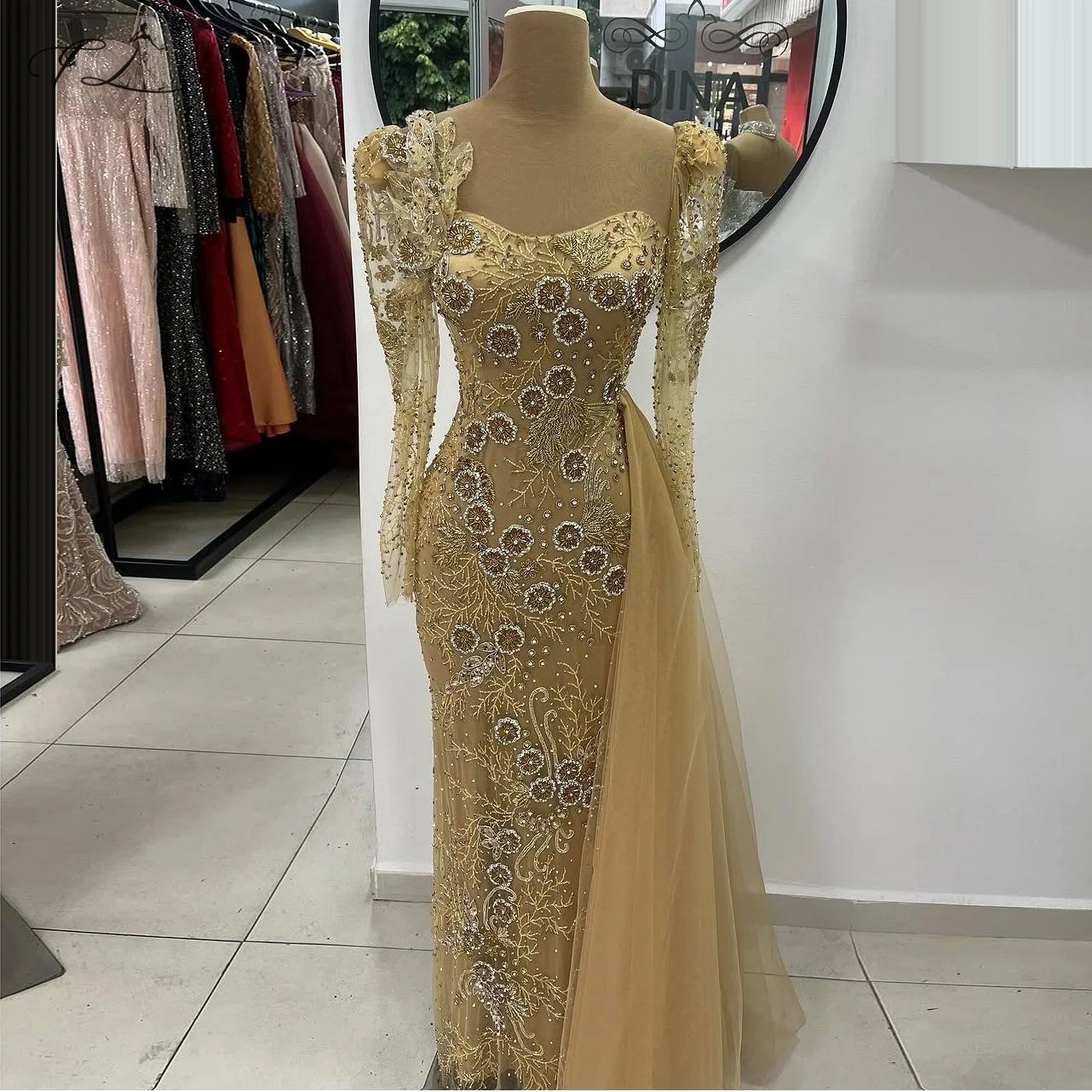 Mermaid evening dress with rhinestone flower bead embellishment side tulle train long sleeves champagne gold long ball gown