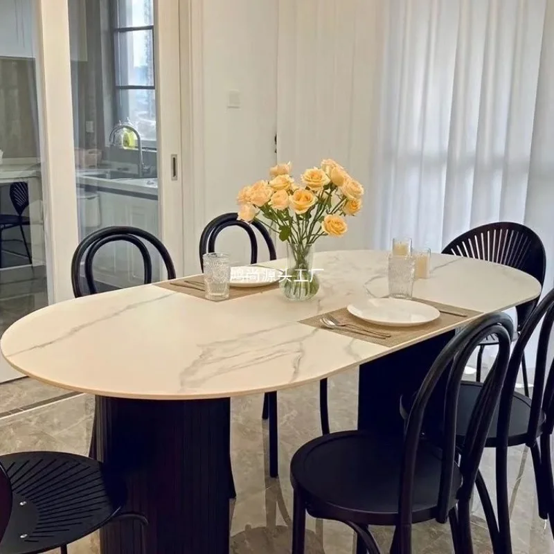 Modern simple black oval dining table household small apartment