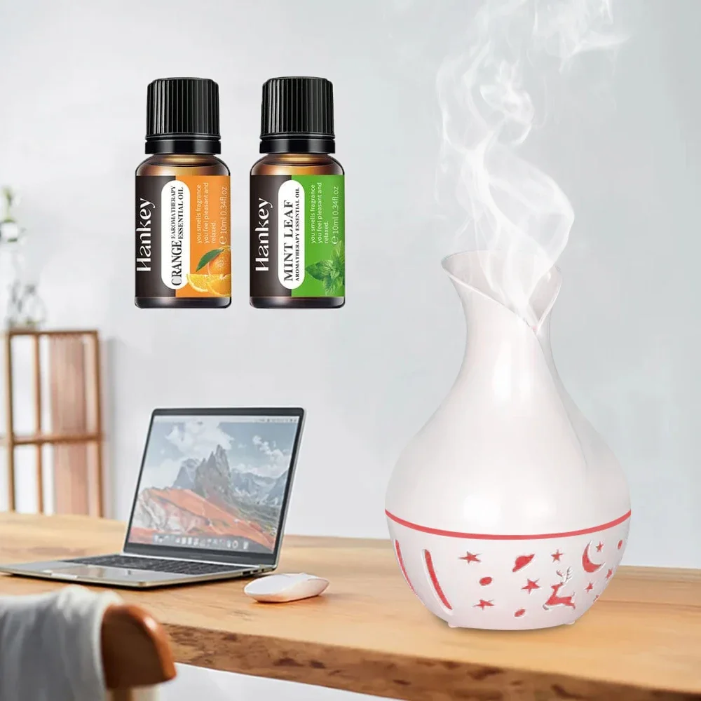 

две бутылки эфирного масла, USB-паровой ультразвуковой мини-увлажнитель с прохладным туманом, очиститель воздуха, 7 цветов, для офиса и дома.