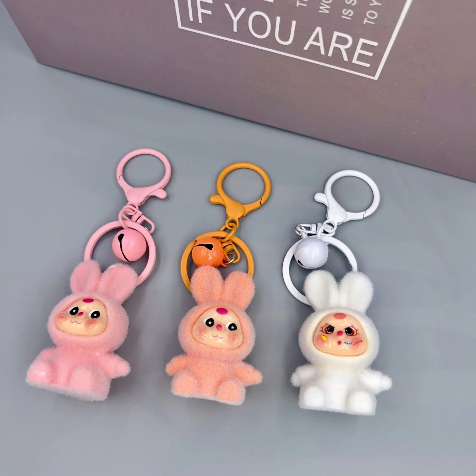 

Resin cute particle three-year-old doll bell pendant, amusing shape schoolbag pendant, keychain bag pendant decoration
