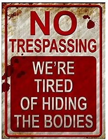 No Trespassing We're Tired of Hiding The Bodies Metal Sign