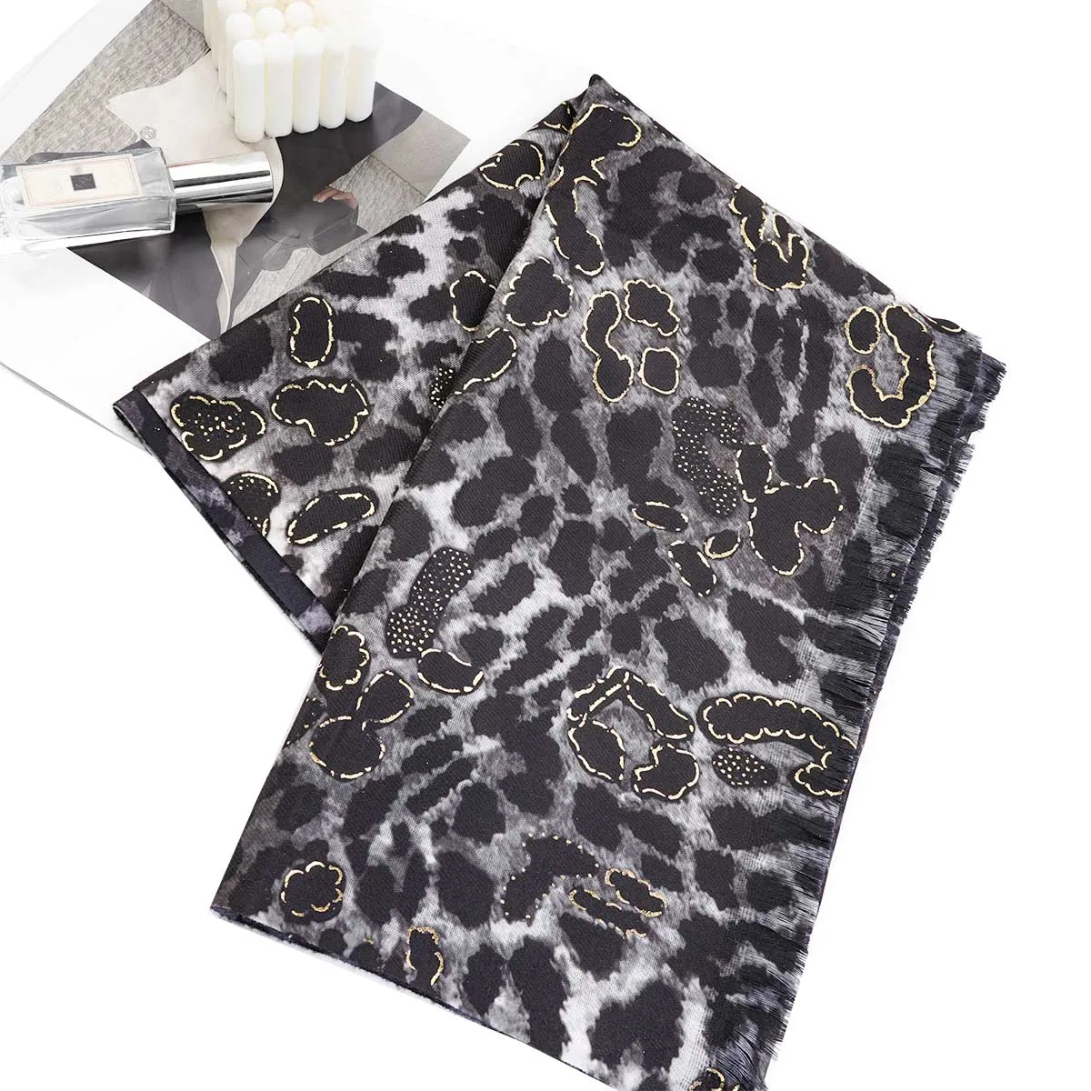 A women\'s leopard print hot stamping warm neck scarf and shawl that can be used as a daily gift