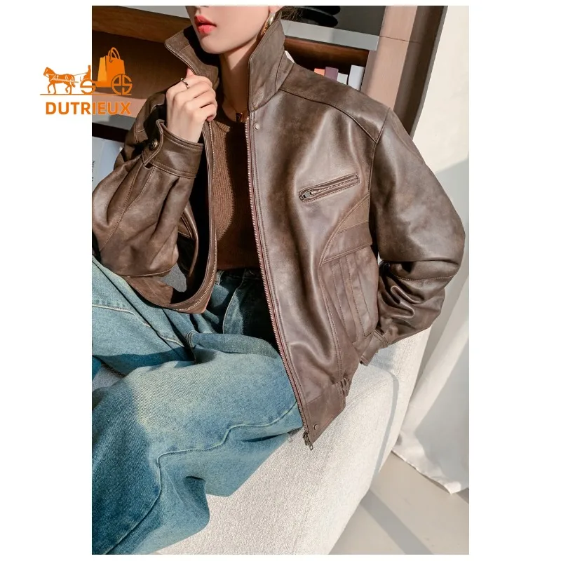 Nieuwe winter dames bruine losse korte leren jas, 100% echte schapenvacht, mode elegante motorfiets leren jas dames