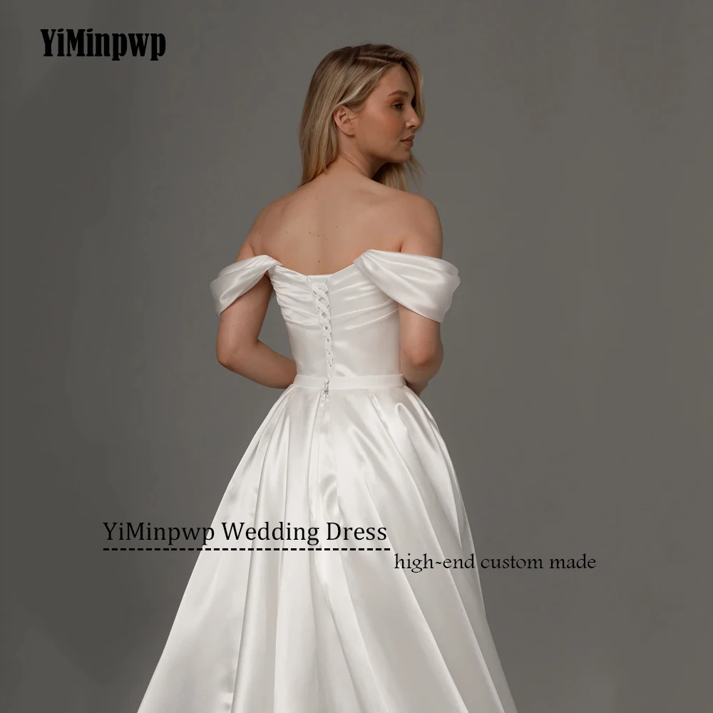 فساتين زفاف أنيقة من الساتان مع ذيل قابل للانفصال بدون أكتاف على شكل حرف a مشد مخصص لحفلات الزفاف 2022 Rode De Morrie