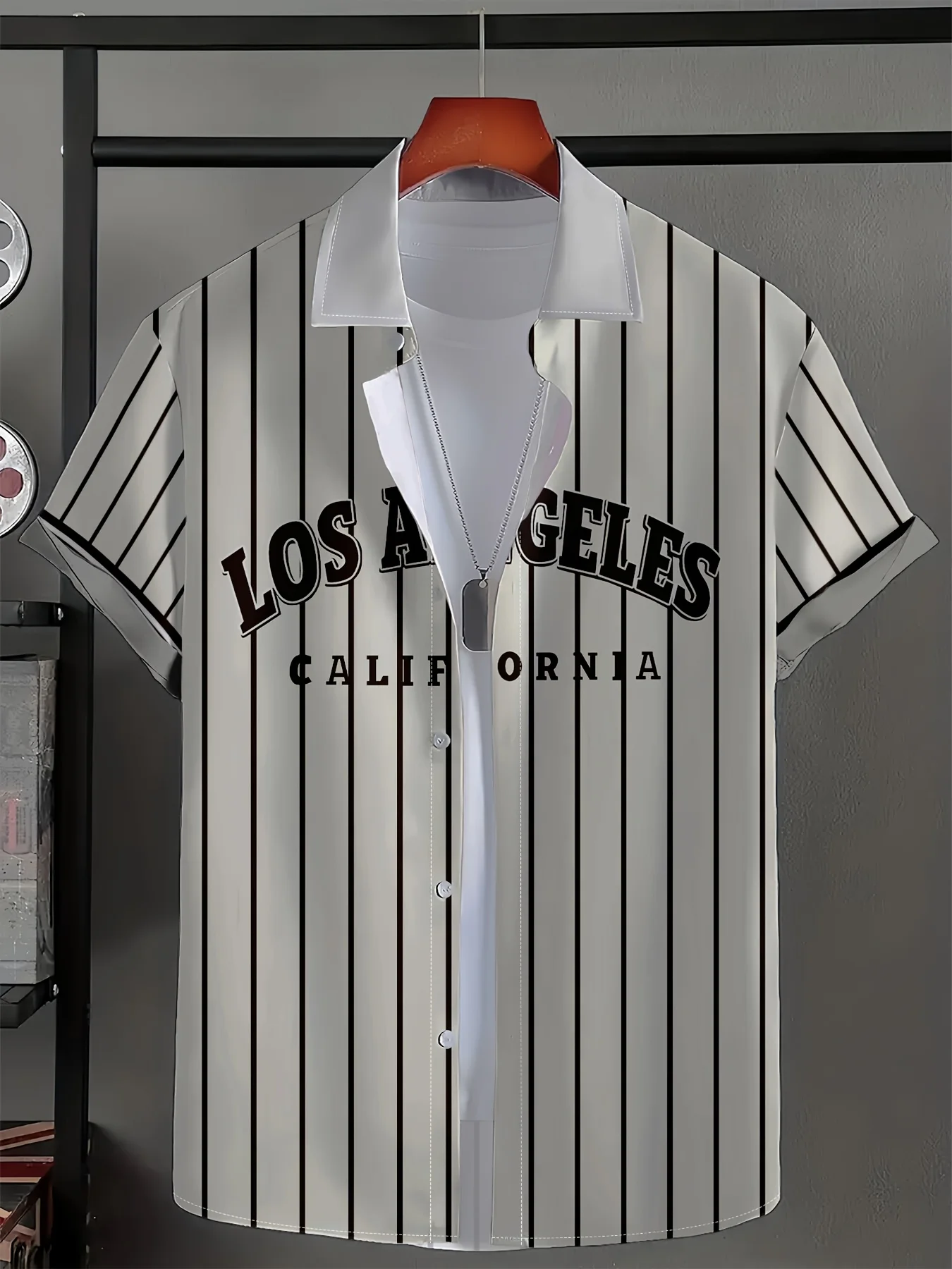 The new men's short-sleeved shirt for summer 2025 is breathable lightweight casual and sporty with striped letter prints