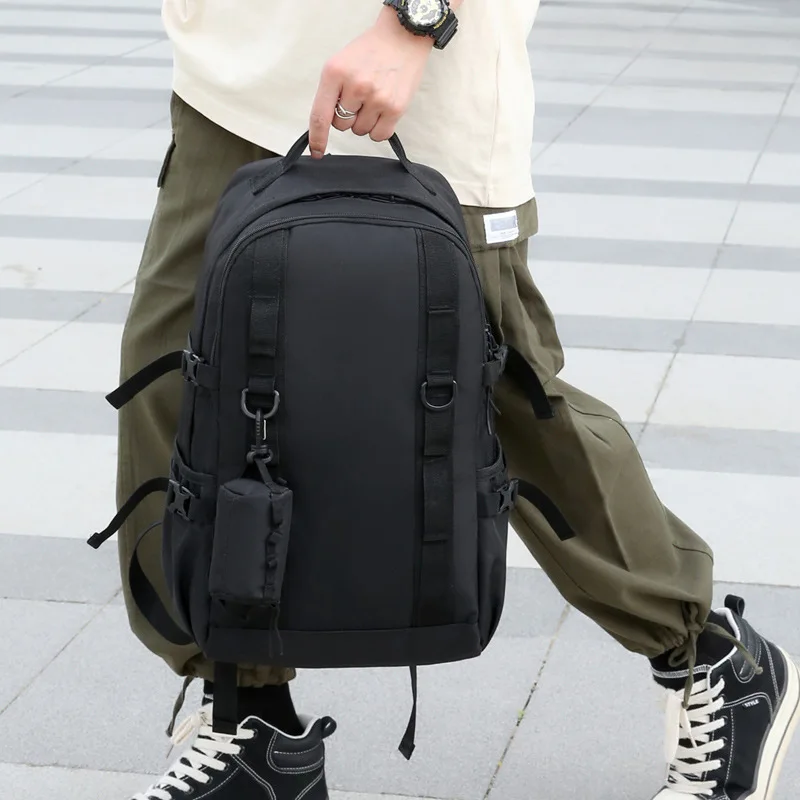 Large-capacity commuter computer travel backpacks for men and women with the same outdoor leisure backpack simple student bag
