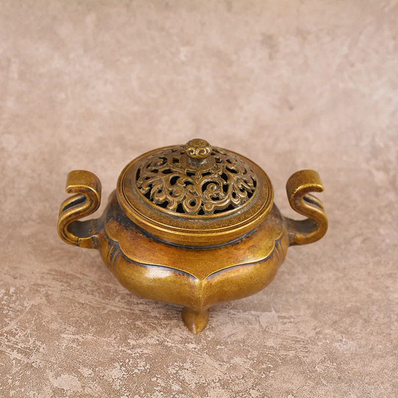 Antique brass incense burner with a patina, featuring a traditional design, suitable home use as a decorative piece or for o