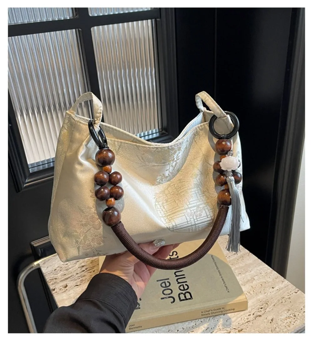 � Mittlere Kapazität ​ Damen-Schultertasche mit Stickerei ​ ​ Ethnische Muster-Stickerei ​ Nähgarn für Handarbeiten ​ ​ Quasten-Anhänger-Tasche ​ – Detail 2