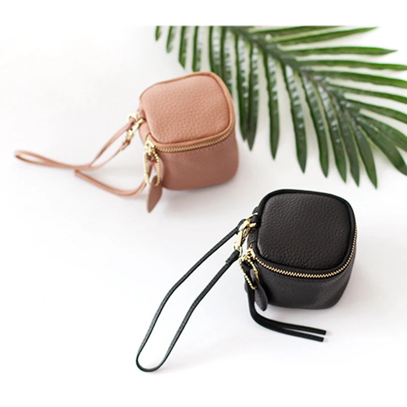 The new first layer of leather hand-held headphones lipstick coins to receive the card bag cushion leather women's  purse