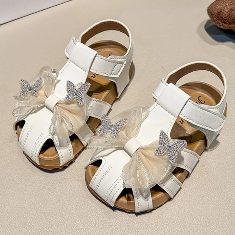 

Летние сандалии для девочек в корейском стиле, модные сандалии для девочек, роскошные сандалии с бантом из стразов для младенцев.