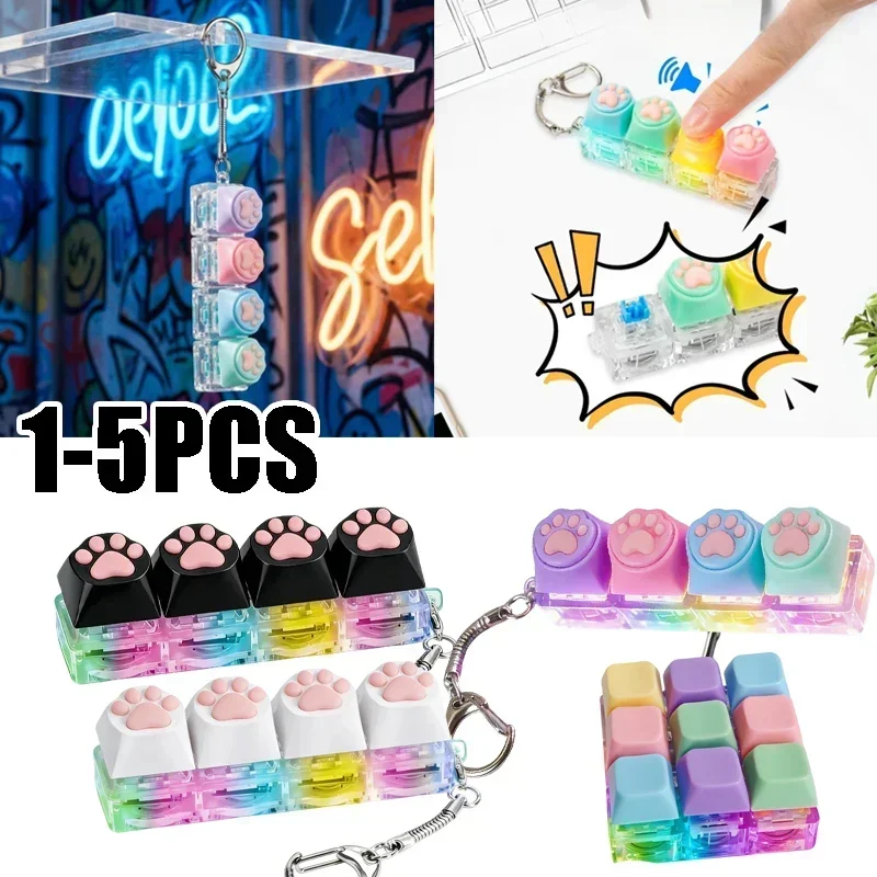 Porte-clés Lumineux Patte de Chat, Jouet Anti-Stress en Silicone, Bouton de Clavier Lumineux, Clicker Portable pour l'Anxiété et le Bureau
