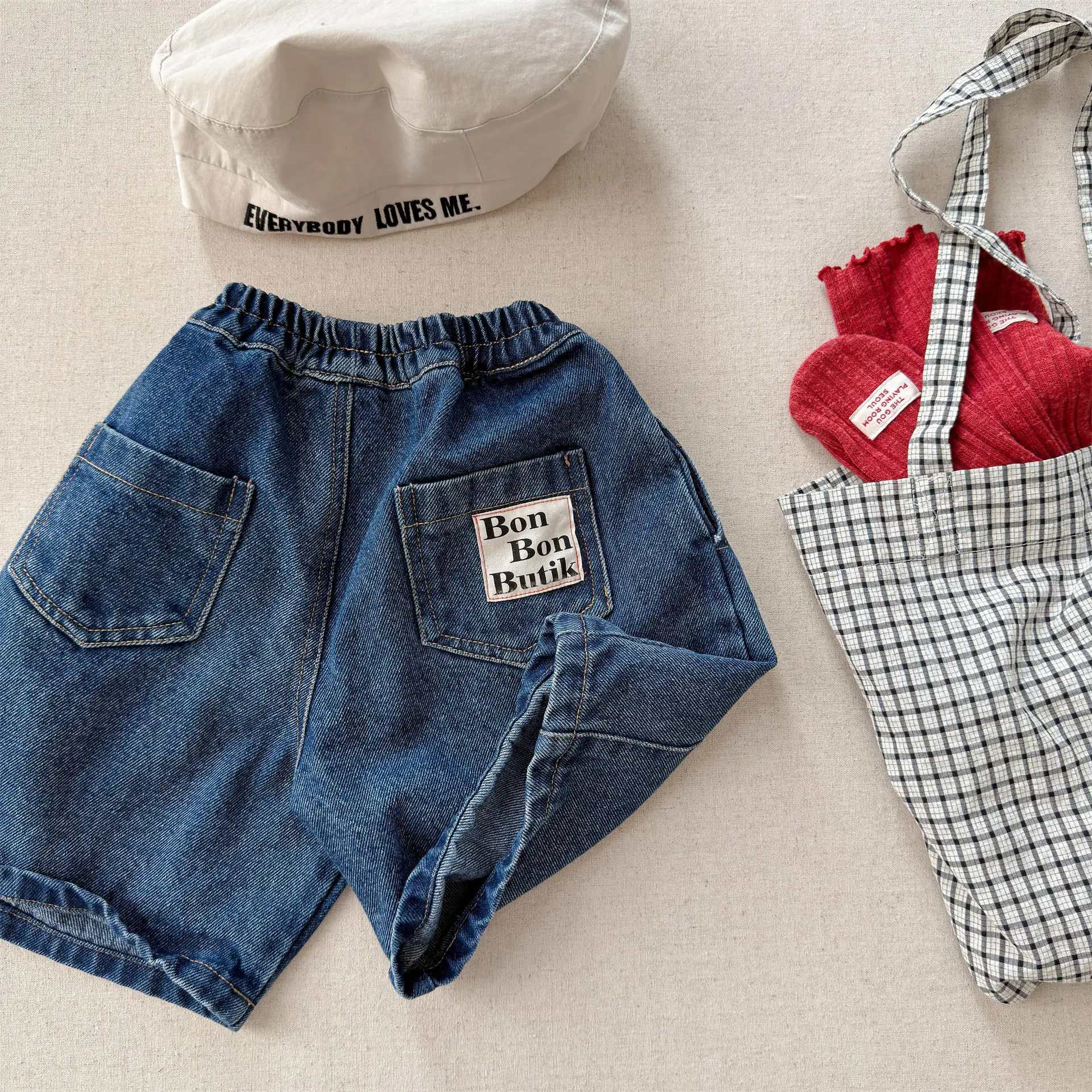 Girls Pants 2026 Spring and Summer New Childrens Clothes Korean Girl Baby Design Feeling Letter Wide Leg Jeans Five Minute Pants