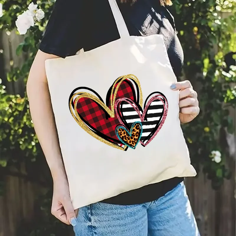حقيبة يد للنساء موضة عيد الحب ليوبارد الحب القلب الجرافيك قماش حمل حقيبة تسوق سيدة حقيبة كتف حقائب كتب الطالب